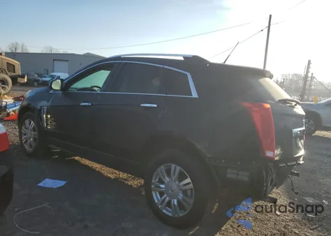 2014 Cadillac Srx Luxury Collection z USA, uszkodzony, nr VIN 3GYFNBE32ES627173